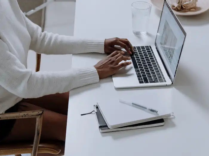 MacBook Pro using his trackpad which has issues while he schedules a MacBook Pro Trackpad repair with Prime Tech Support in Miami