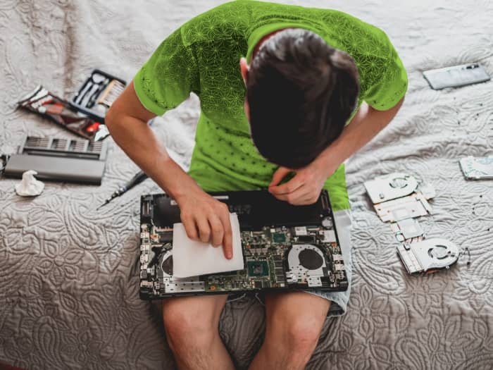 A customer attempting to repair his own MacBook Pro.