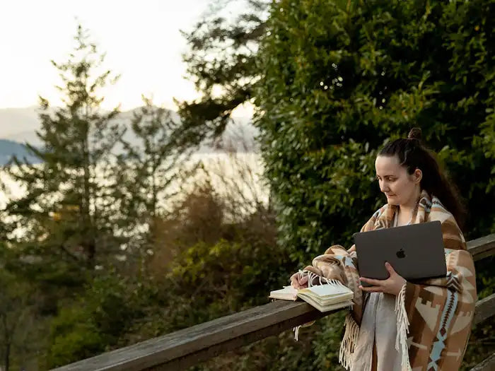 Woman using a just cleaned laptop for sustainable purposes