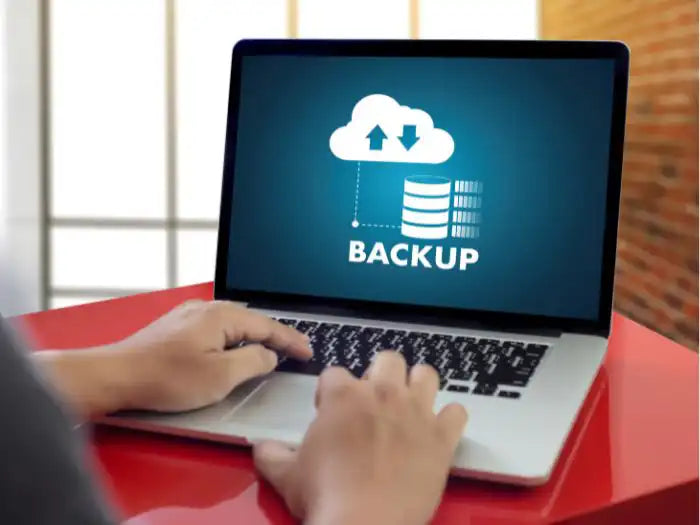 MacBook Pro customer reading the blog and implementing the tips for data transfer in Miami