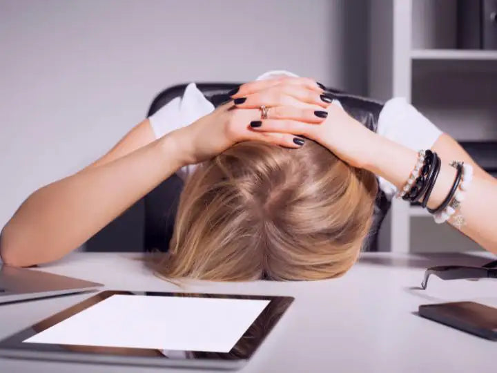 Person frustrated using her tablet in Miami Dade County. Our professional technicians will repair the iPad in no time in our lab.