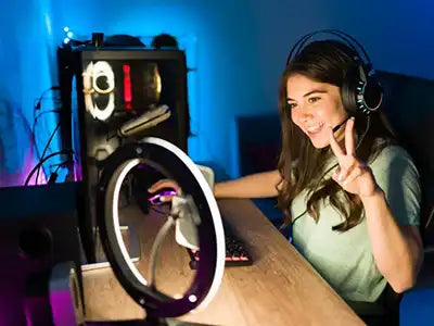 Woman in Miami using her Gaming PC to stream her gaming experience to her followers. 
