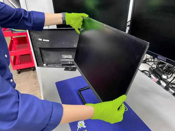 Our computer tech is going to replace the screen of this call-in-one (AIO) computer in our Store in Miami