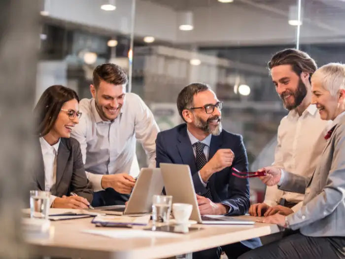 Happy customers cheering and celebrating after fixing multiple device issues related to connectivity in a company located in Miami Dade County.