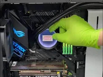 Technician at Prime Tech Support in Miami, Florida expertly upgrading an AIO on a high-end gaming PC.