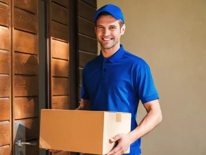 Delivery man returning and delivering a computer from a customer located in Miami who had her computer repaired by our Prime Tech Support technicians
