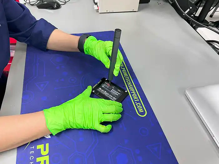 Desktop data recovery service performed in Prime Tech Support lab using a screwdriver to dissemble de hard drive for a customer located in Miami