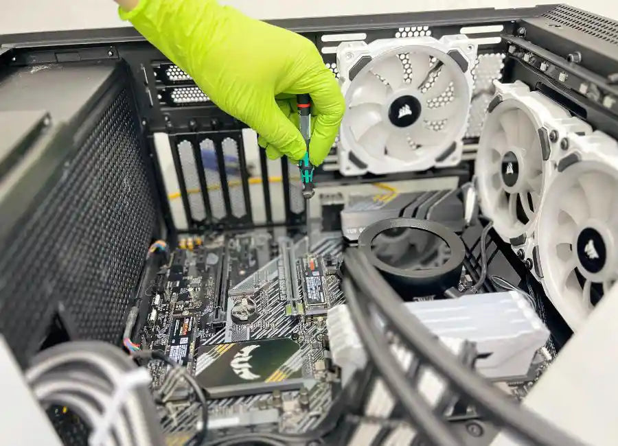Gaming PC computer cleaning performed at Prime Tech Support Lab in Miami. Our tech is using a air cleaning device to keep the unit free of dust to avoid overheating.