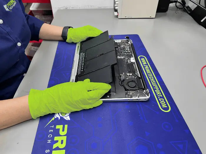 In our lab, we perform a battery replacement for a MacBook Air that was not charging. The MacBook Air prompts for battery service, which is essential to prevent potential logic board issues in the future.