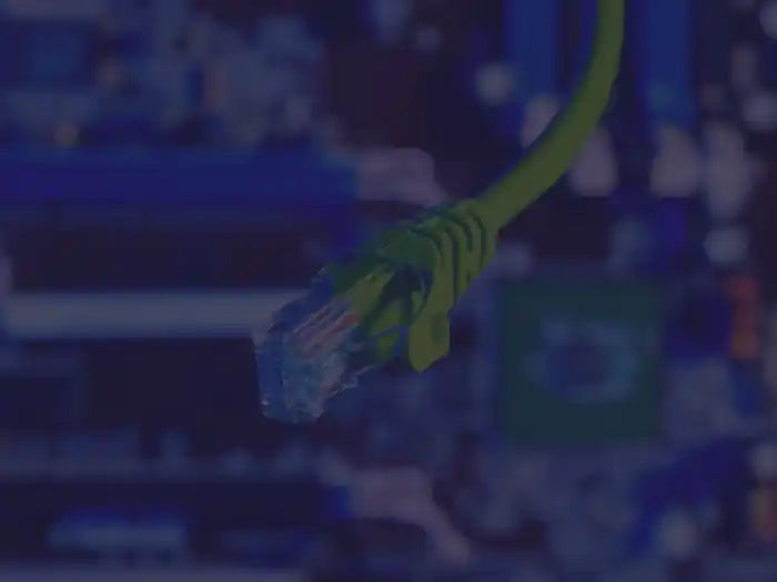 Ethernet cable connected to network hardware representing advanced WiFi design and configuration service.